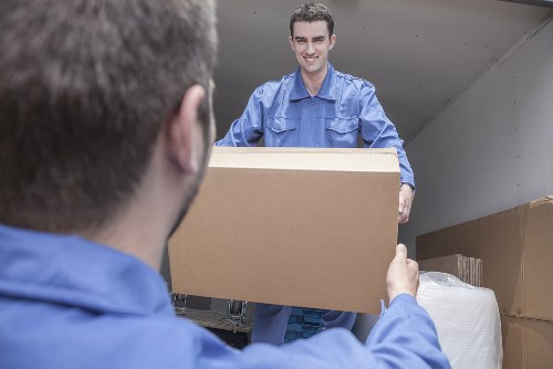 Removal van and moving boxes in Yeading residential street