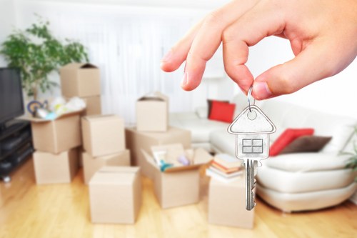 Professional movers handling furniture during a Yeading house move