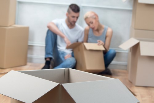 Organized storage boxes and wrapped furniture inside a storage space
