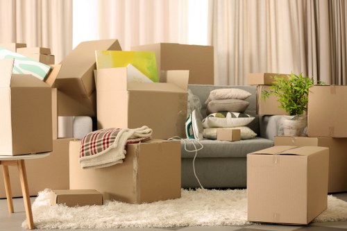 Staff preparing desks and equipment for an office move