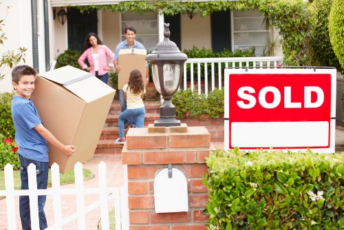 Professional movers handling office furniture in Yeading