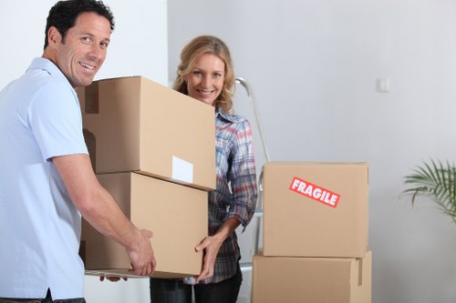 Packed moving boxes and furniture prepared for short-term storage